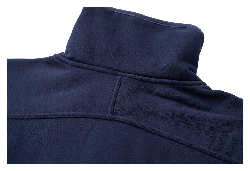 Close-up of the back collar and shoulder seams of a navy garment.