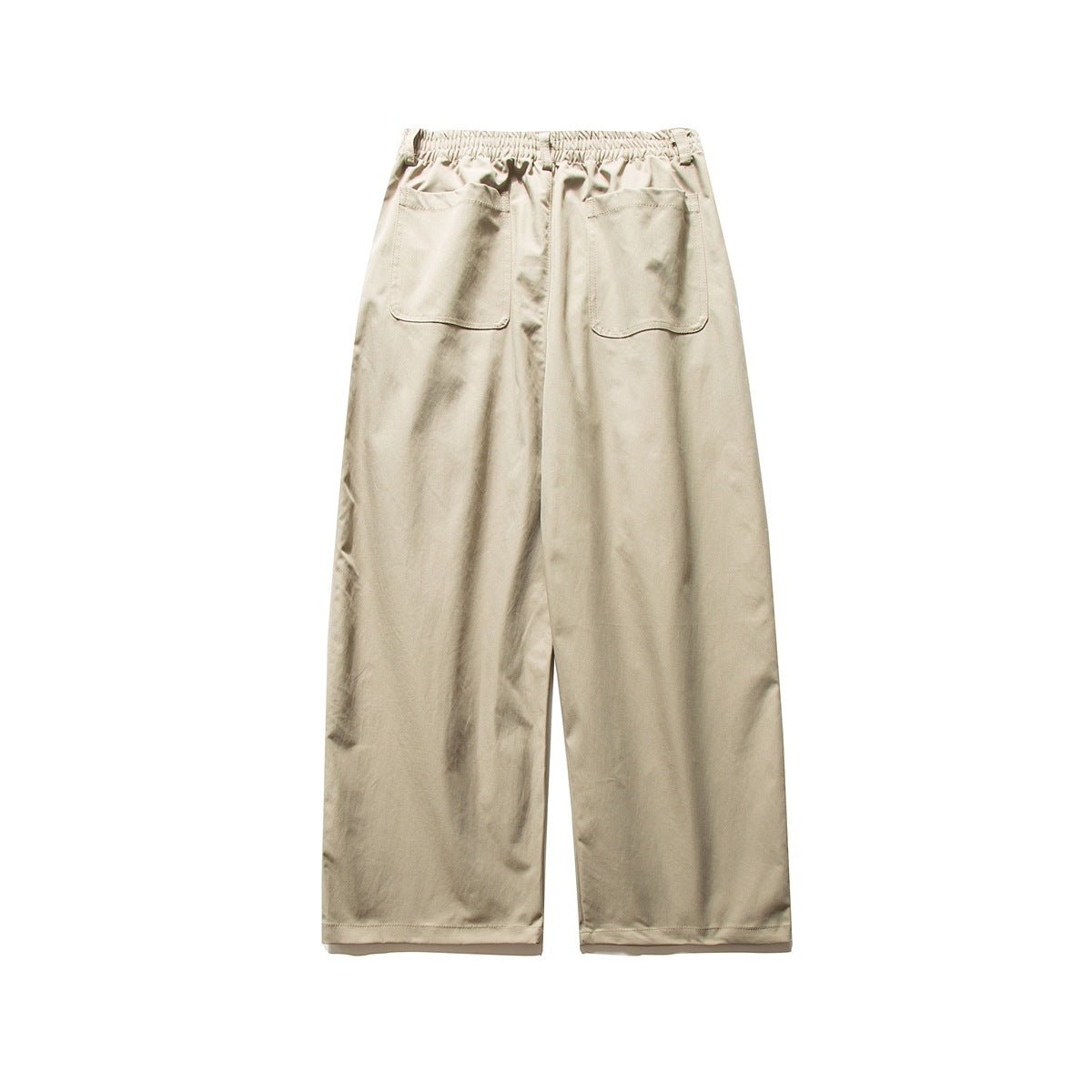 Rear view of beige wide-leg trousers with an elasticated waistband and two back pockets.