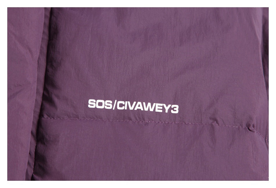 Close-up of white lettering printed on the plum jacket's quilted chest panel.