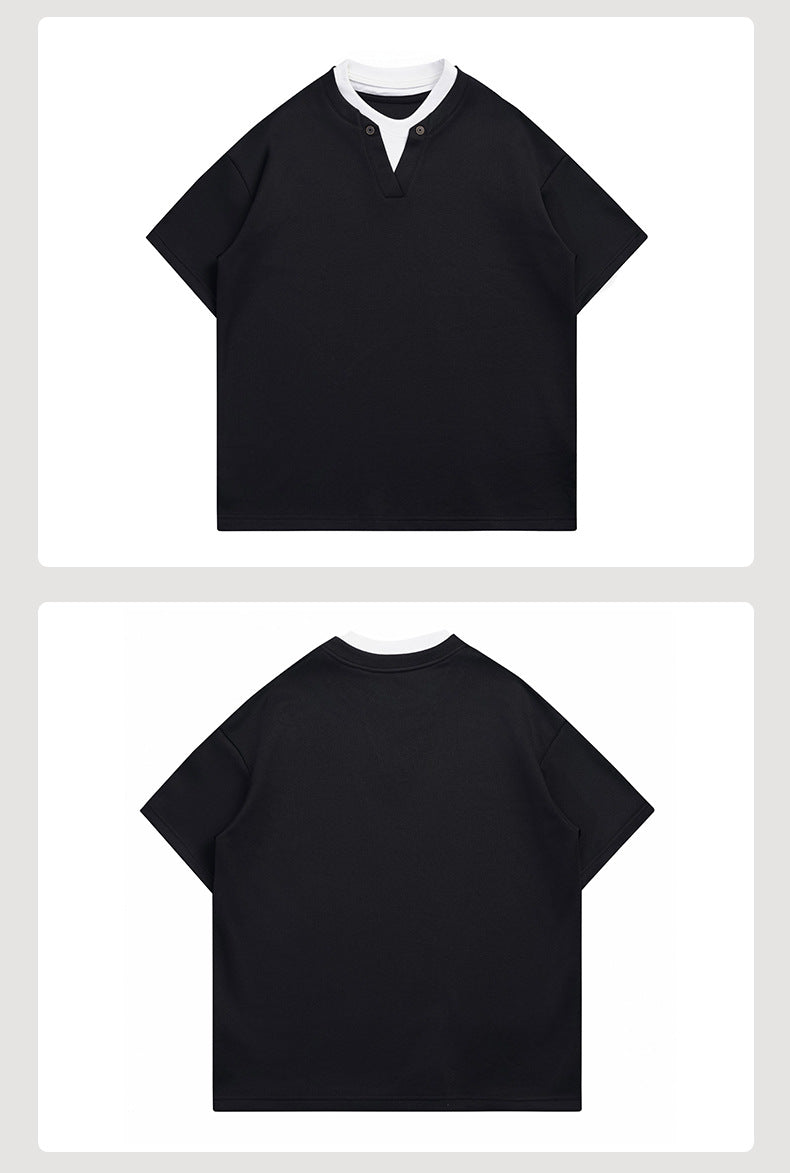 Front and back flat views of a black short-sleeve shirt with a white layered collar and two-button placket.