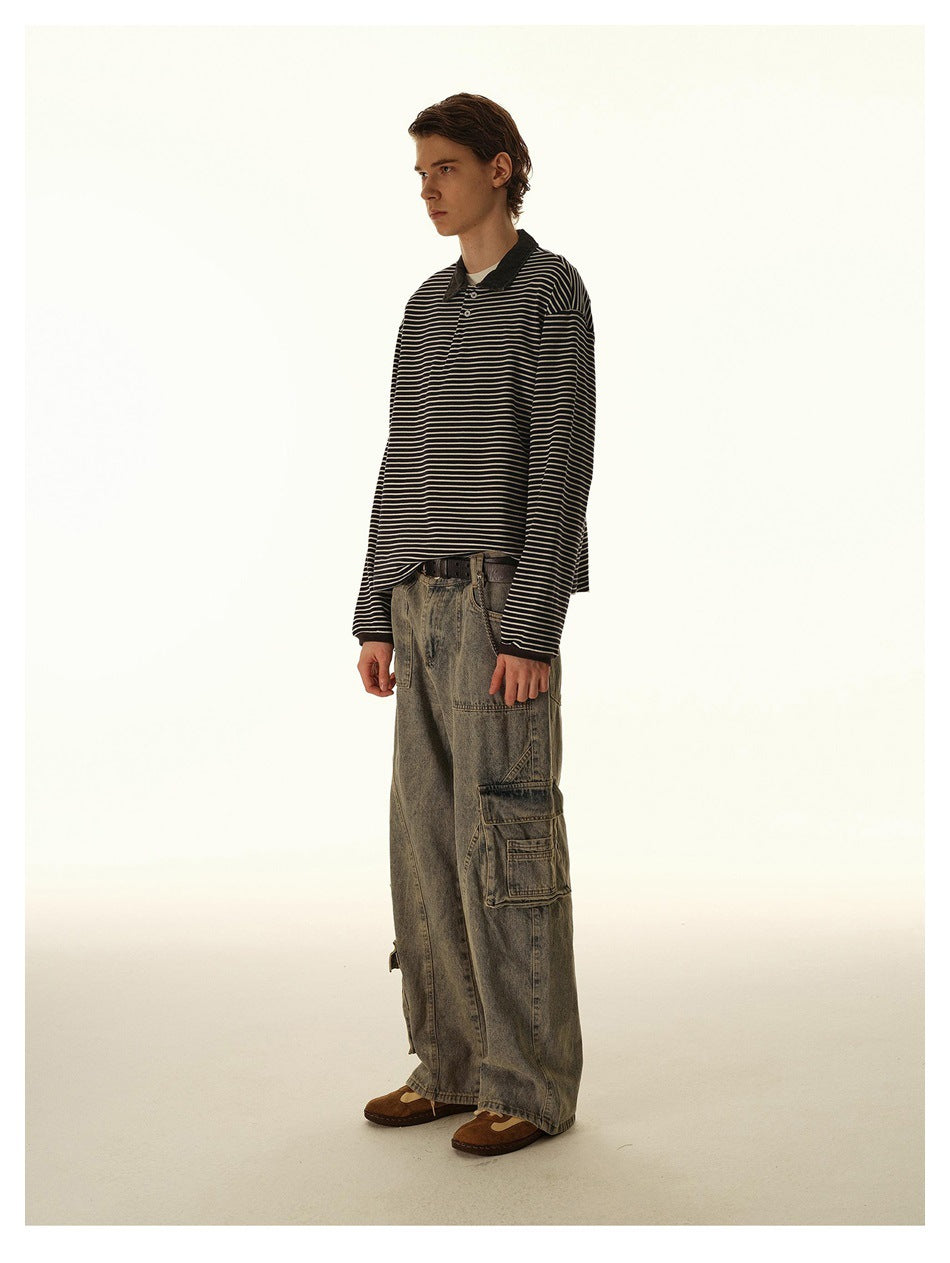 Model in washed wide-leg cargo jeans with a striped long-sleeve polo, side view