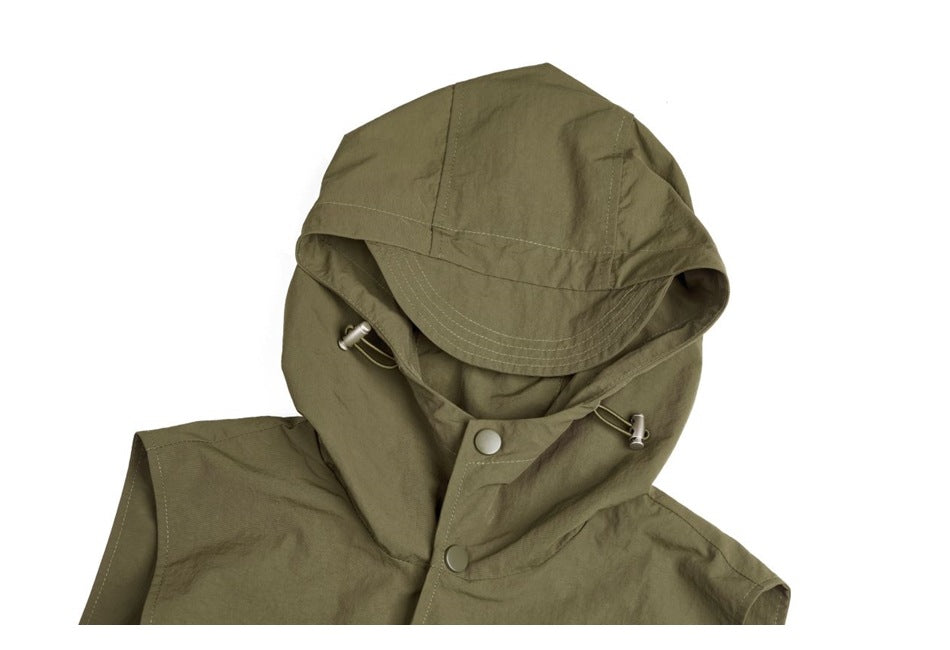 Cropped front view of an olive-green hooded jacket with a curved brim, drawcord toggles and snap closure.
