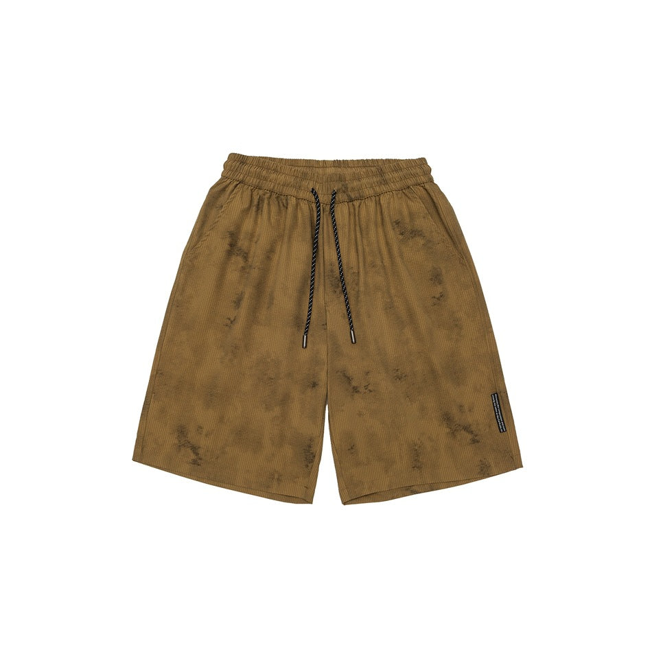 Khaki tie-dye-look drawstring shorts with elastic waist, front view on a white background