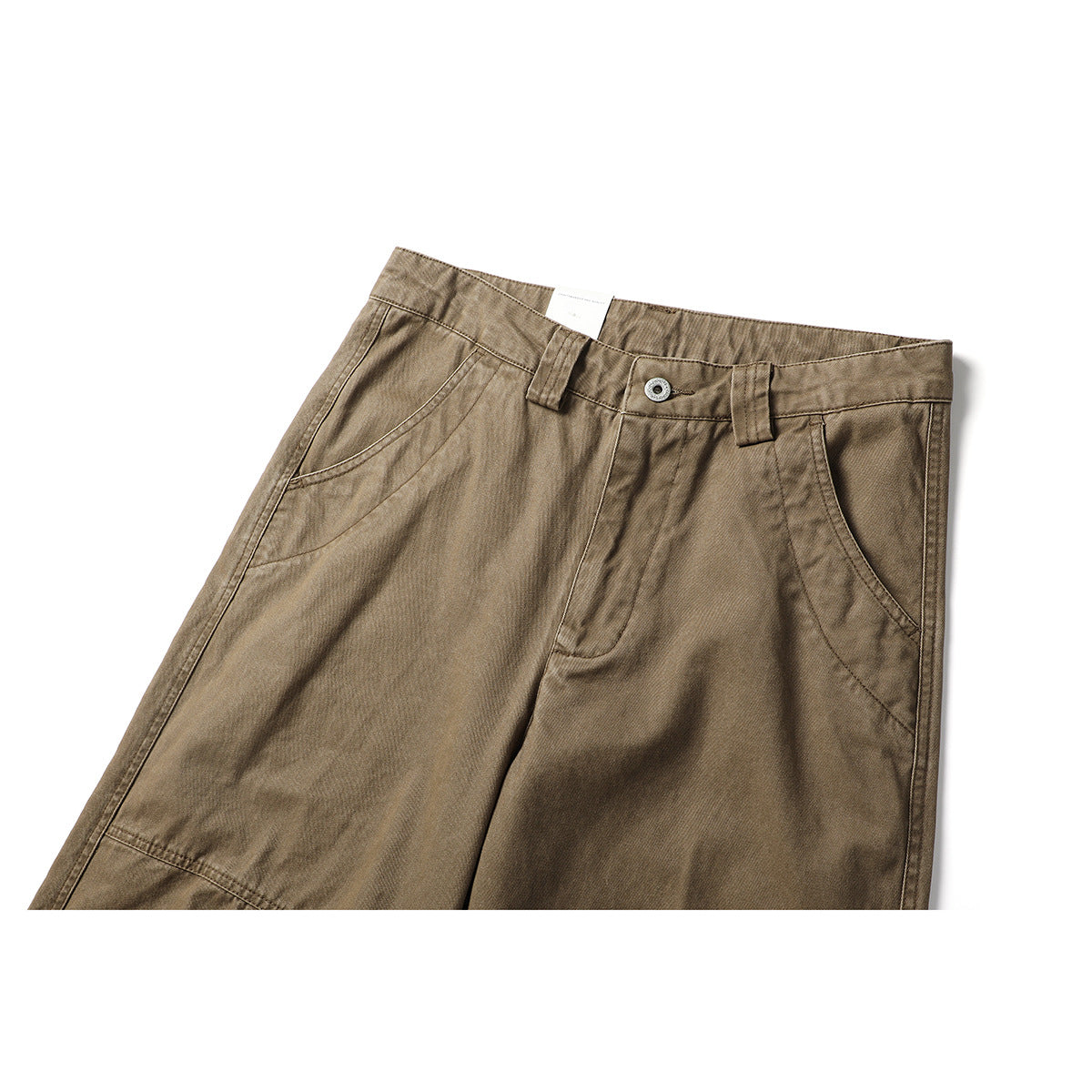 Close-up of tan-brown trousers showing the front waistband, button, belt loops, and curved pockets.