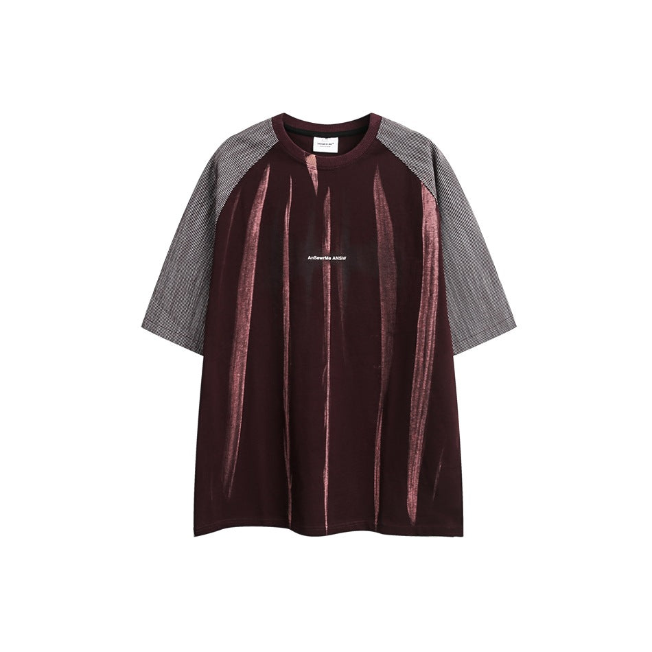 Burgundy raglan short-sleeve T-shirt with pink vertical brushed streaks and gray striped sleeves, front view