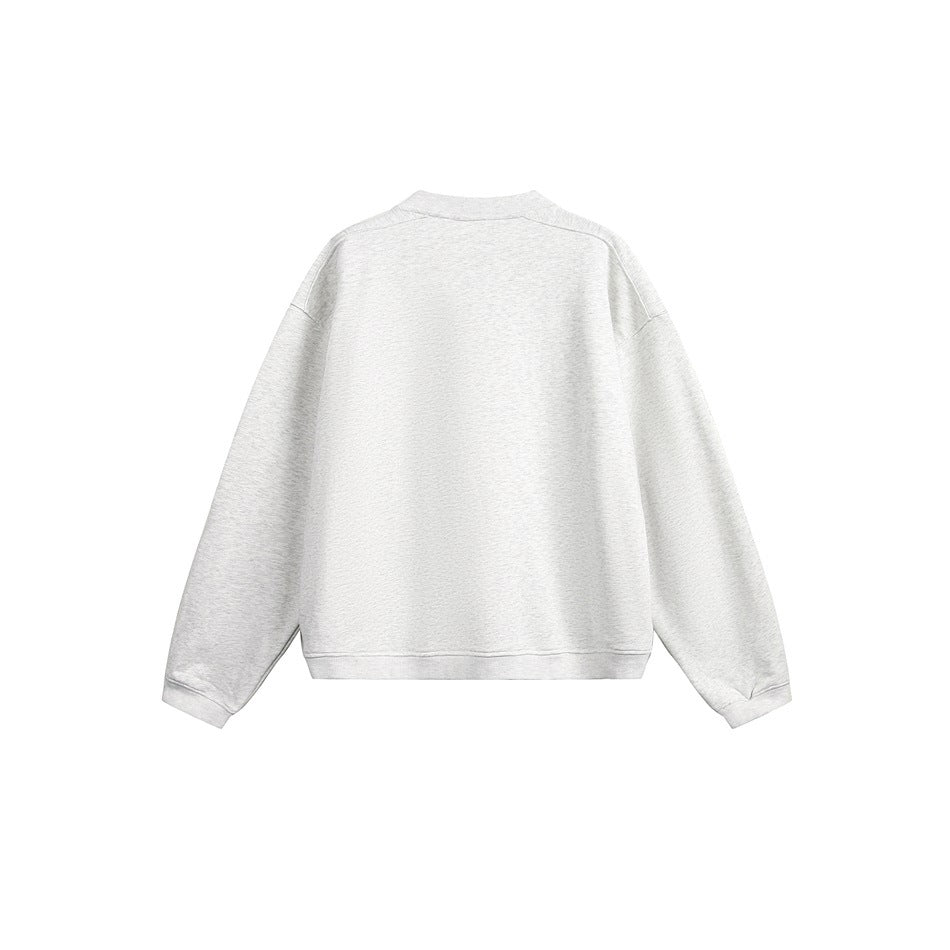 Back view of a light gray crewneck sweatshirt with long sleeves and ribbed cuffs and hem.