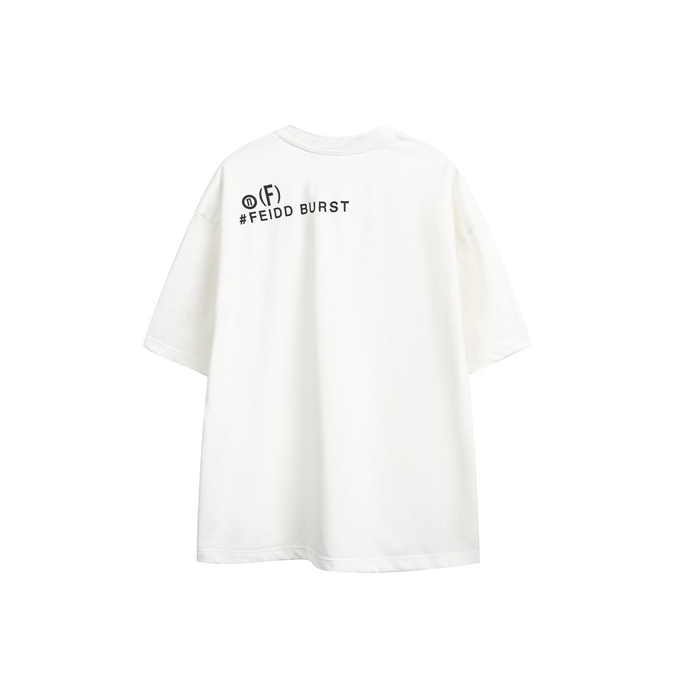 Flat lay of the back of a white oversized T-shirt with black lettering near the shoulders.
