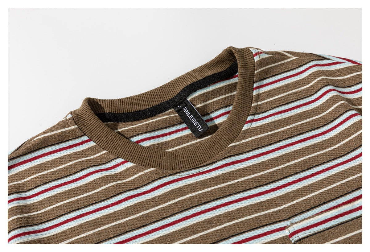 Close-up of the striped T-shirt's ribbed brown crew neck and black inner neck label.