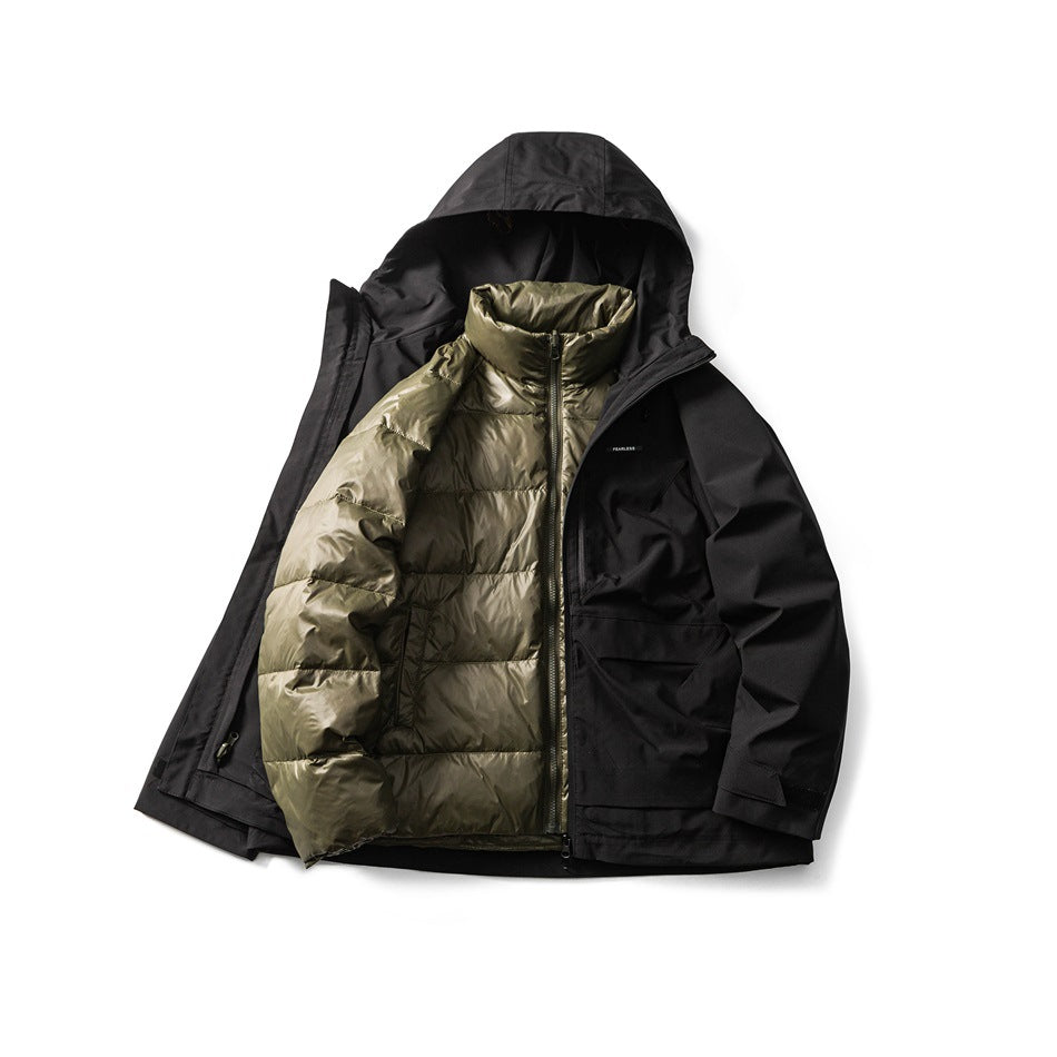 Black hooded jacket flat lay, open to show the olive green quilted puffer inner jacket with stand collar