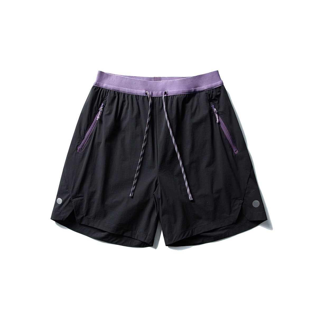 Black drawstring shorts with purple waistband, purple zippers and purple-and-white rope cord, flat lay