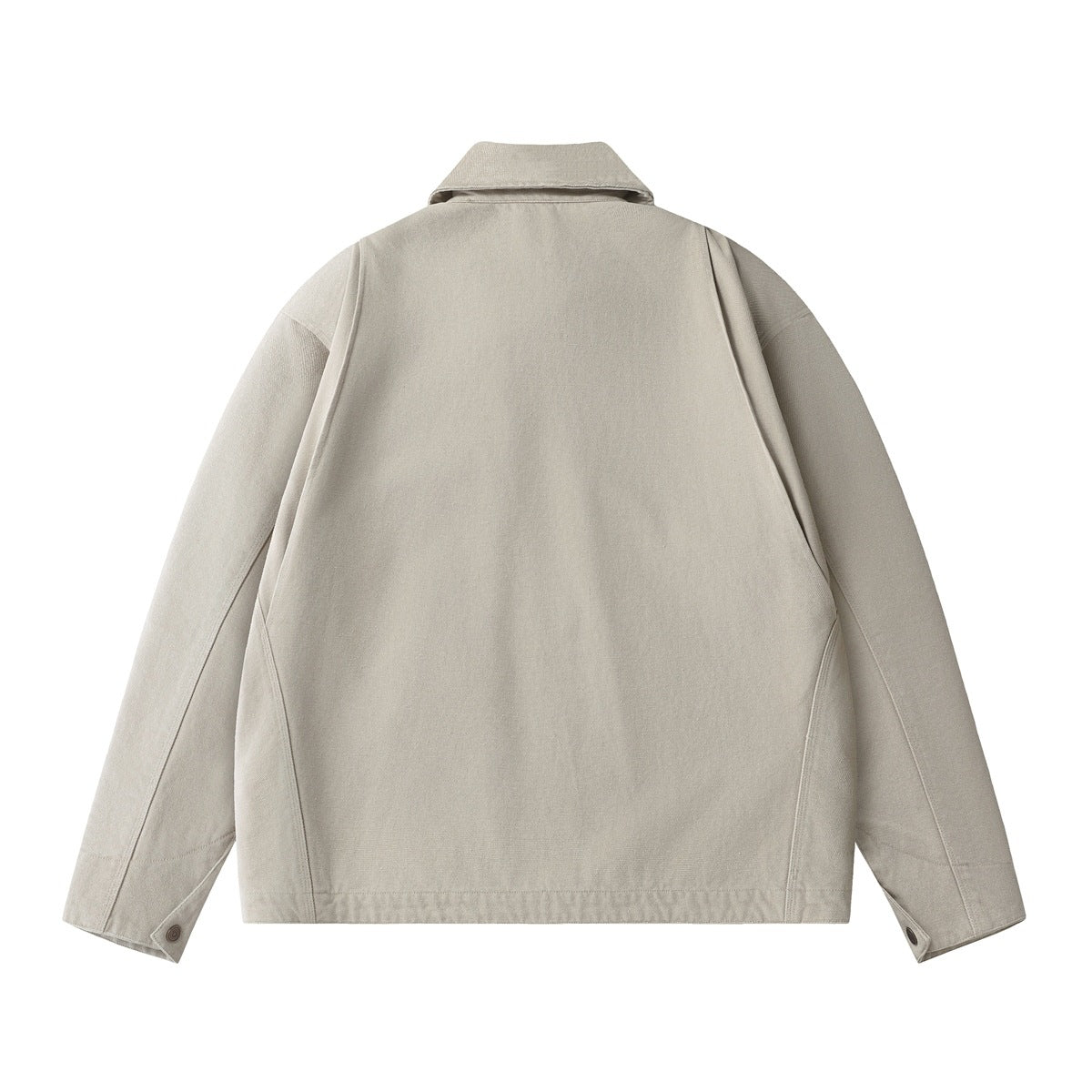 Back view of a light beige jacket with a pointed collar, long sleeves, shaped seam panels, and buttoned cuffs.