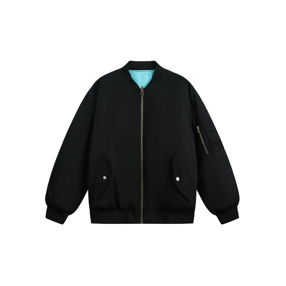 Front view of a black bomber jacket with gold-tone zipper, snap pockets and turquoise lining, shown flat.