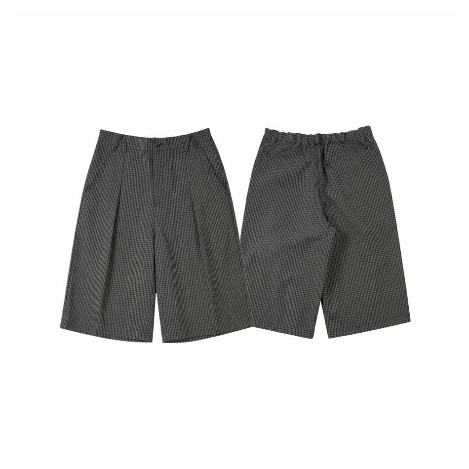 Dark gray plaid knee-length shorts shown from the front and back, with wide legs and a buttoned front waistband.