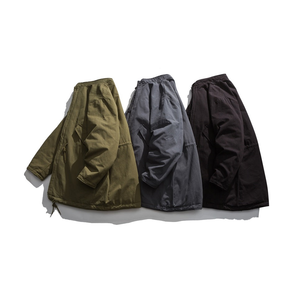 Three coats shown together in olive, charcoal, and black colorways.