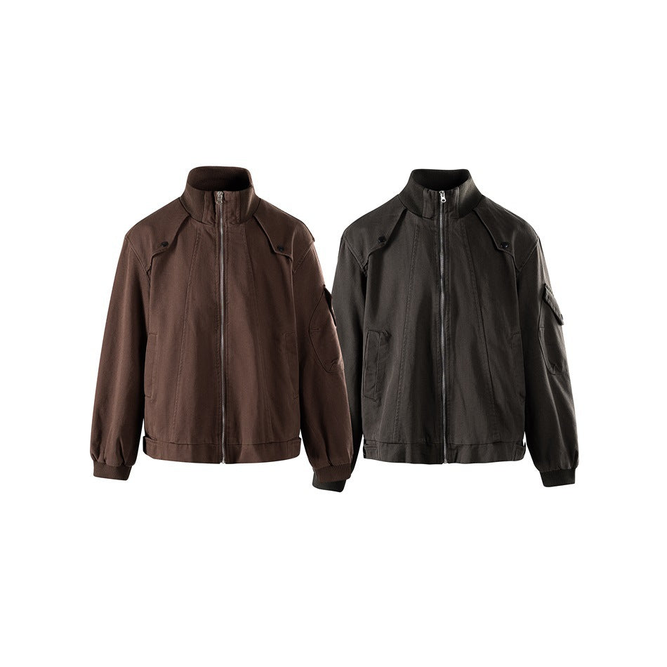 Two front views of a zip-front jacket with stand collar, in brown and dark charcoal.
