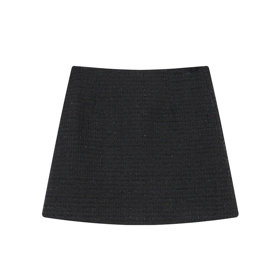 Black tweed-style A-line mini skirt flat lay on a white background