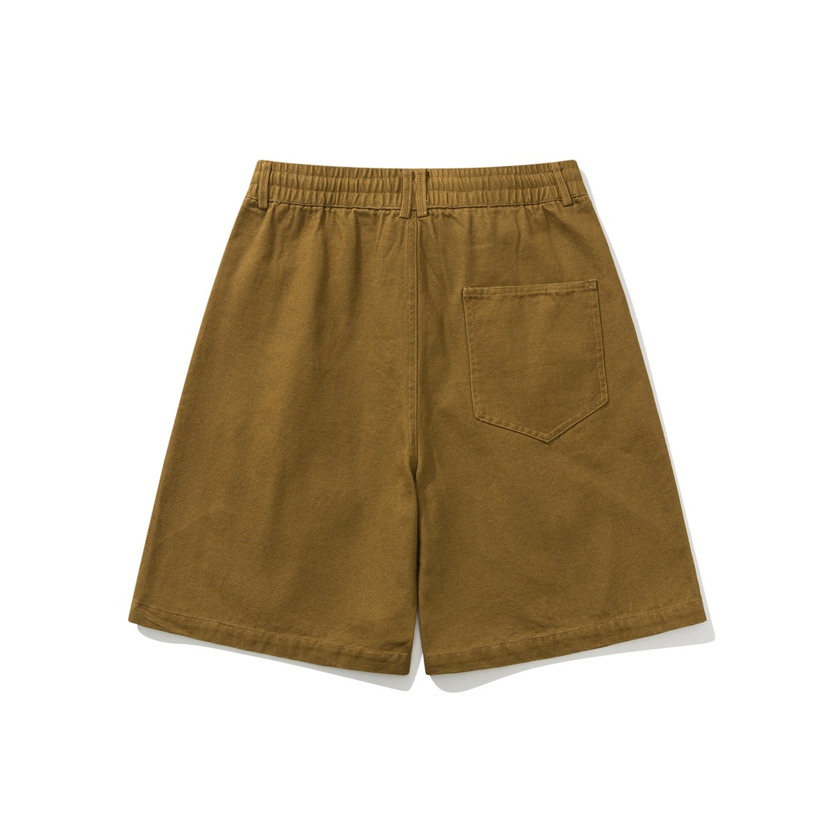 Back view of mustard-brown wide-leg shorts with an elasticated waistband and a single patch pocket.