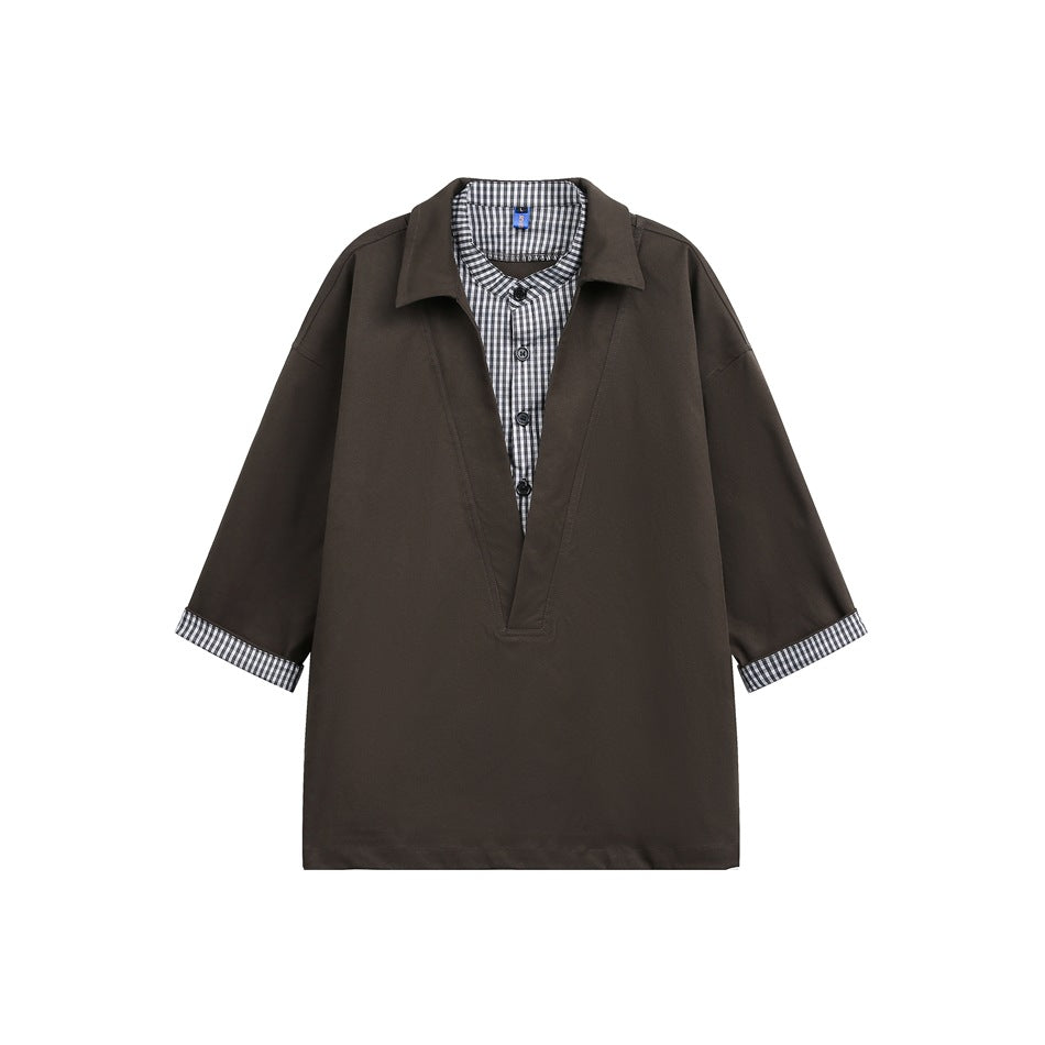 Brown faux two-piece shirt with collared V-neck outer layer, gingham shirt insert and gingham rolled cuffs, flat lay