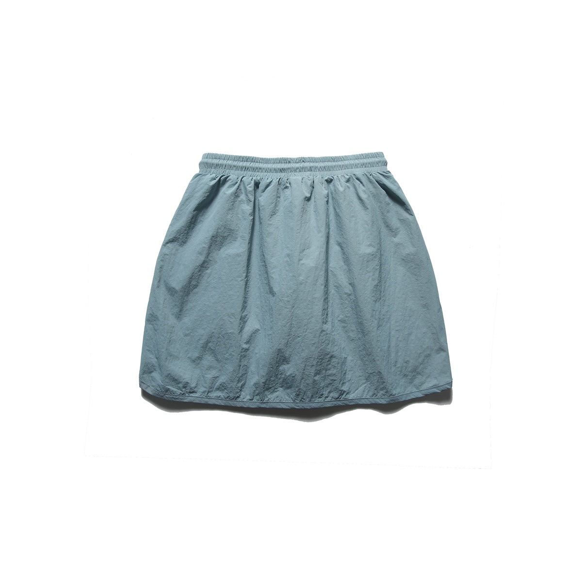 Back view of a pale blue-gray skirt with a gathered elastic waistband and a plain, gently flared body.