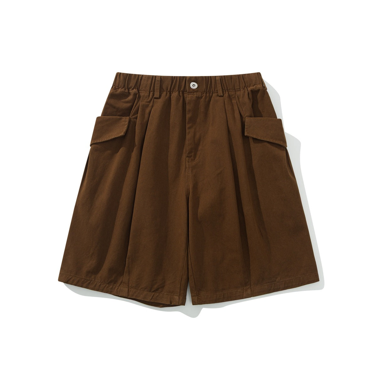 Reddish-brown knee-length wide-leg shorts with elastic waist, button front, pleats and large flap side pockets, flat lay