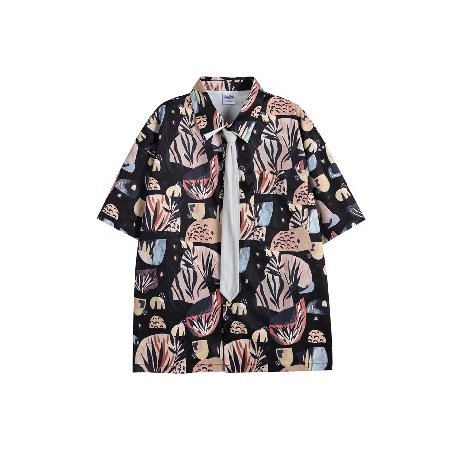 Black short-sleeve shirt with abstract botanical print, chest pocket and gray neck tie, flat front view