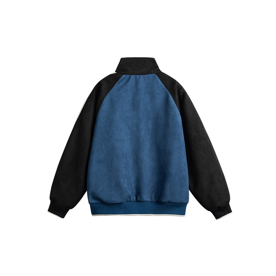 Back view of a blue and black jacket with a solid blue center panel, black sleeves, and a ribbed hem.