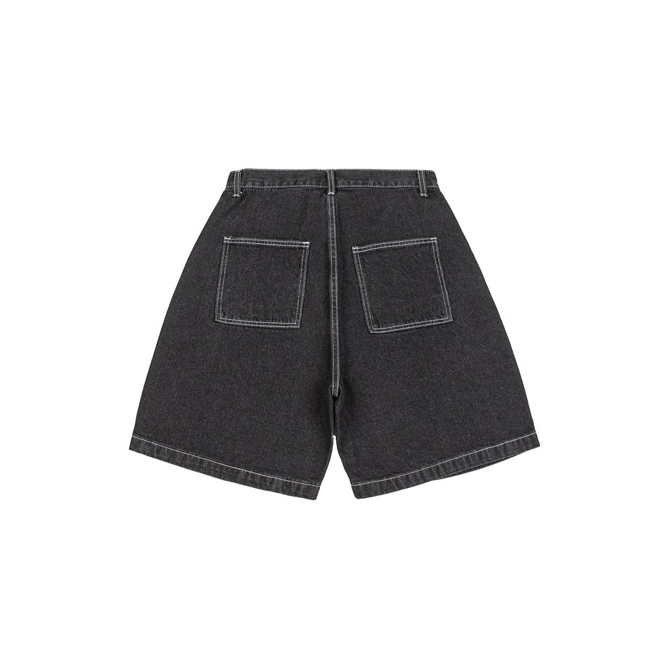 Back view of black washed denim shorts with two patch pockets and contrast stitching