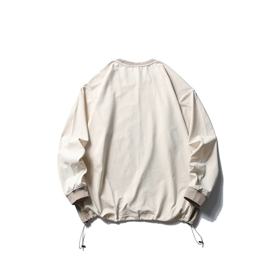 Back view of an ivory long-sleeve pullover with gray-beige collar and cuffs and hem drawcords.