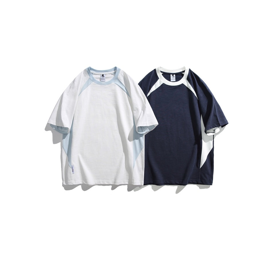 Two short-sleeve raglan T-shirts displayed side by side: one white with pale blue panels and one navy with white panels.