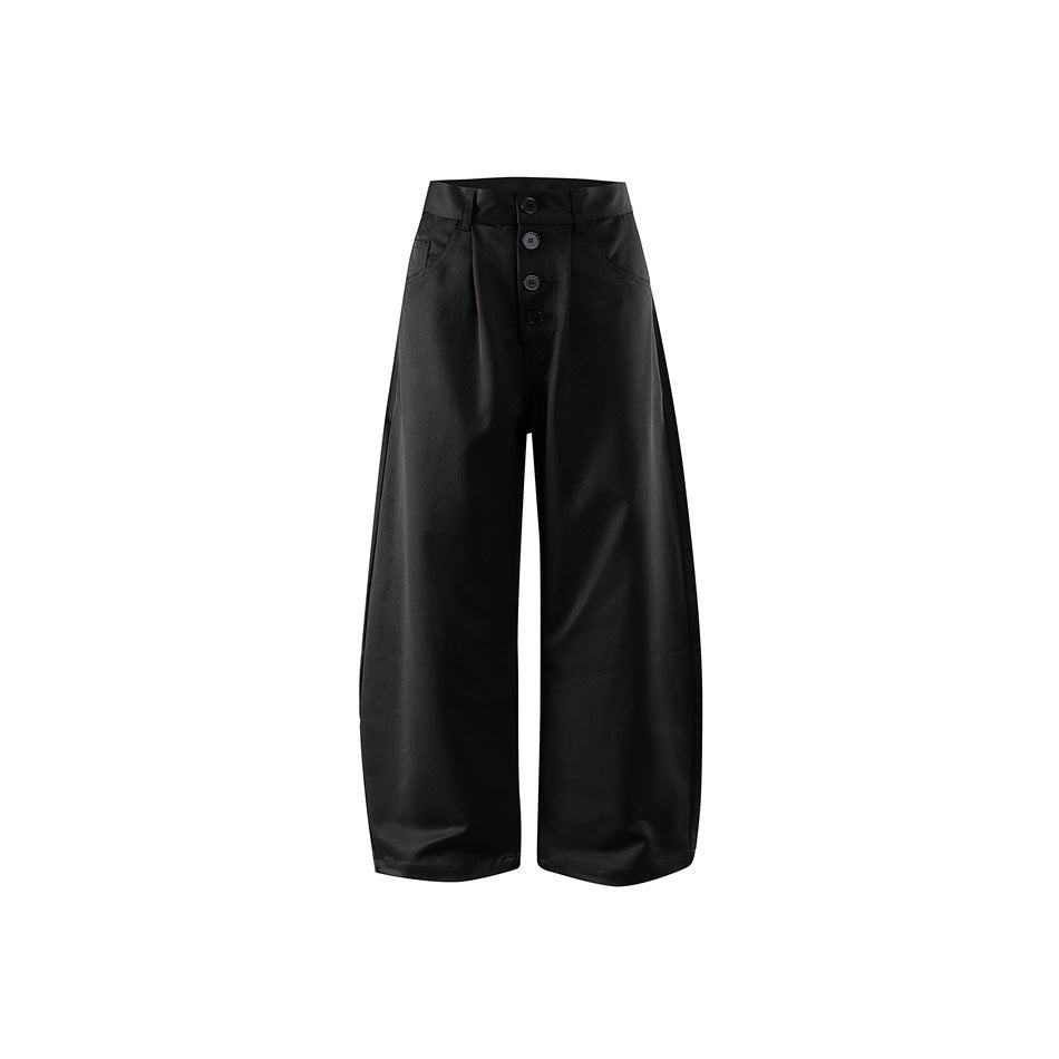 Black wide-leg barrel pants with a four-button front, pleat and belt loops, flat front view on white