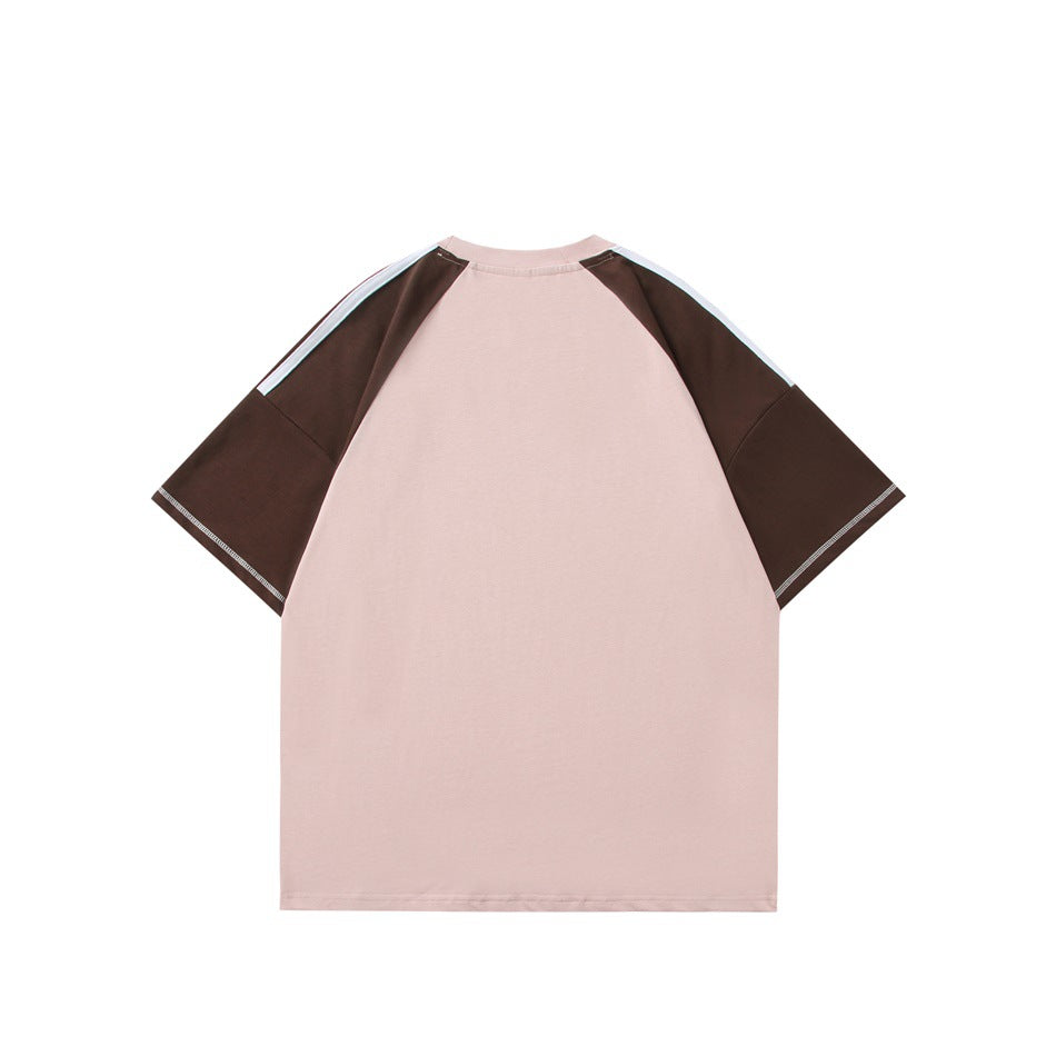 Back view of a pink raglan T-shirt with dark brown short sleeves and narrow white shoulder stripes.
