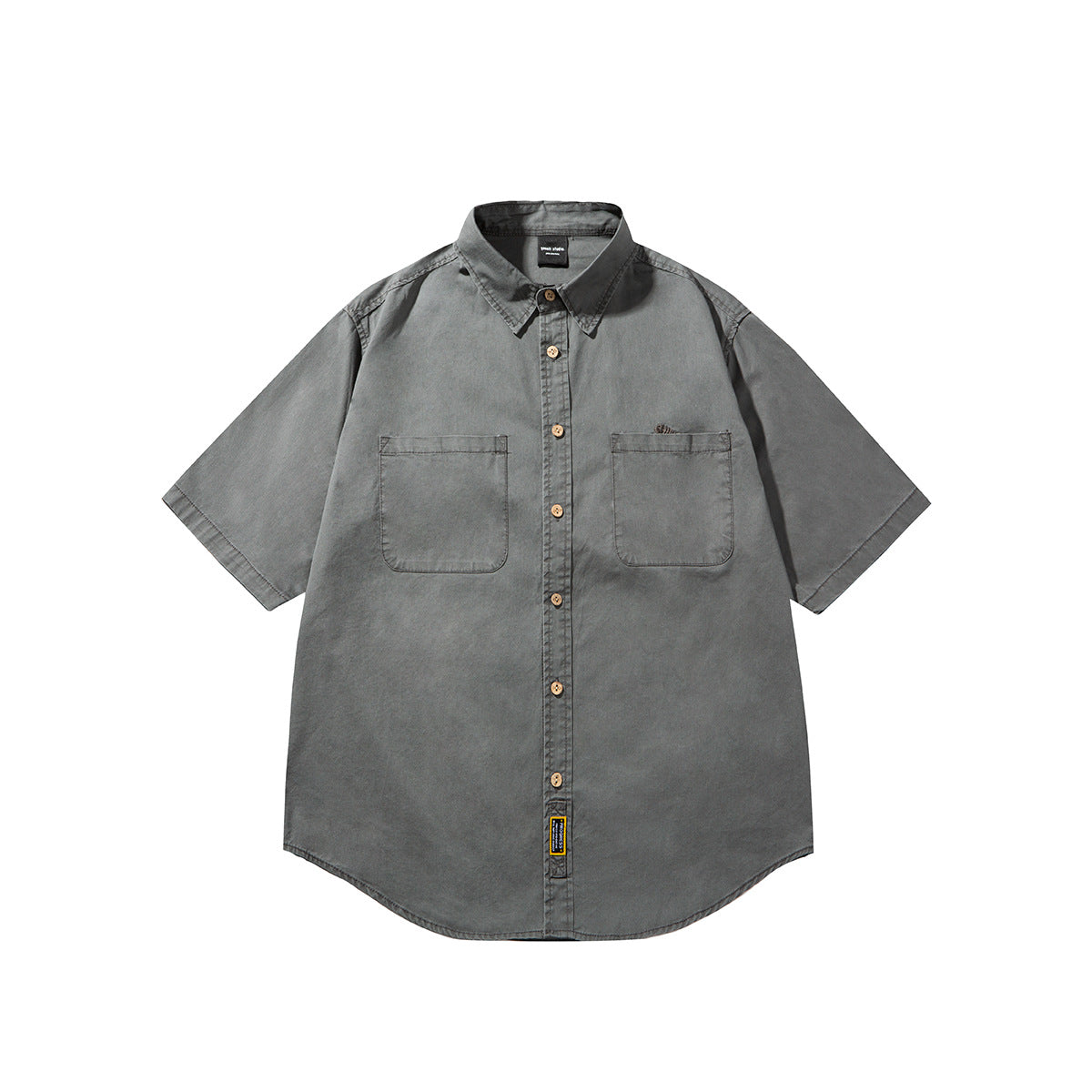Dark gray short-sleeve button-front shirt with wood-tone buttons and two chest pockets, flat front view