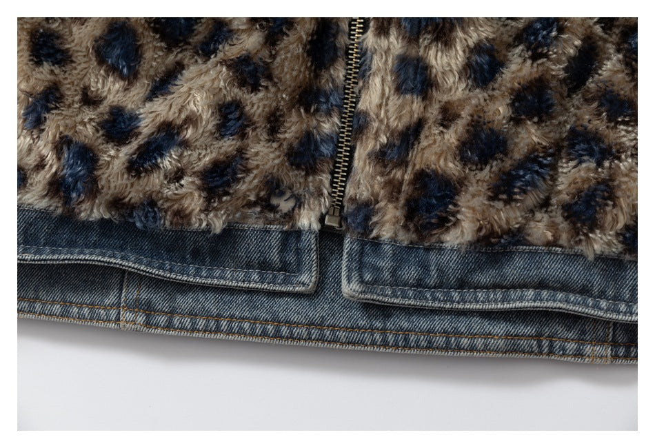 Close-up of the jacket's front zipper, spotted plush panels, and denim hem.