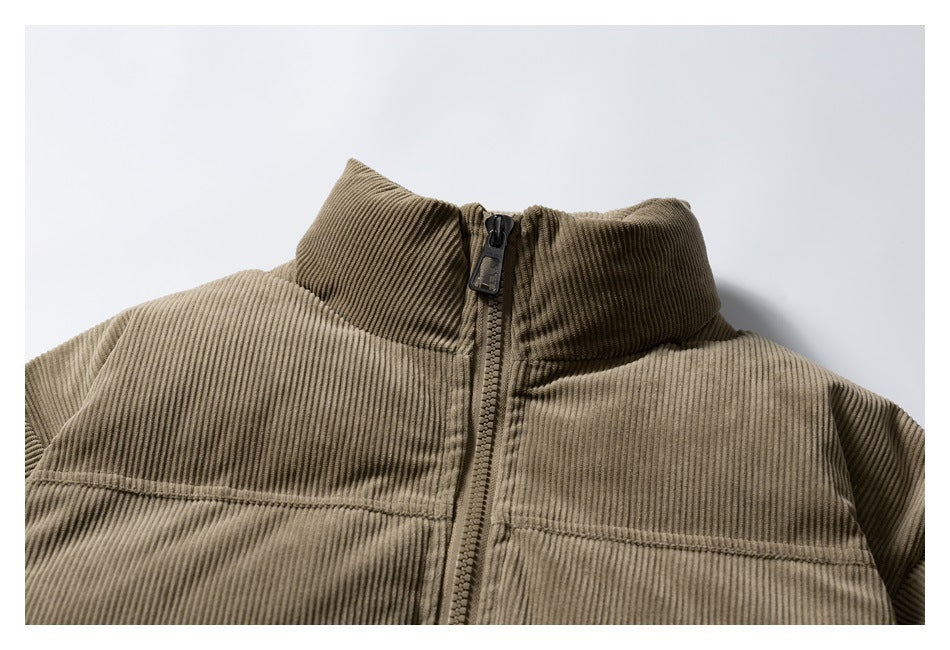 Close-up of the jacket's ribbed high collar and centered front zipper.