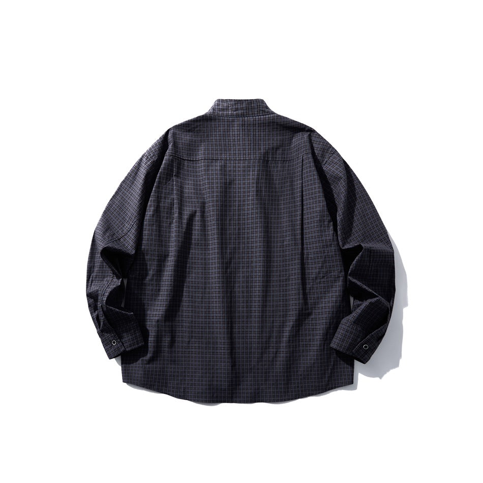 Back view of navy small-check plaid long-sleeve shirt with stand collar, yoke seam and snap cuffs, flat lay