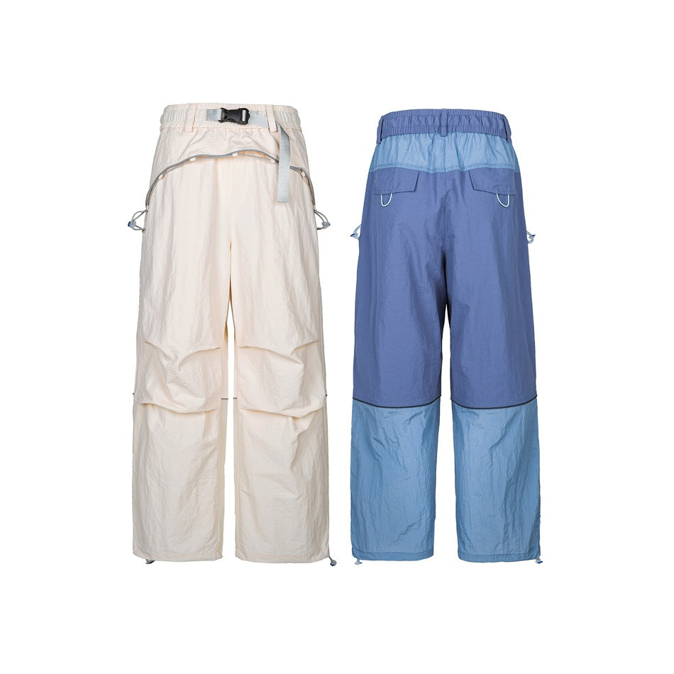 Full-length beige pants shown from the front beside blue color-block pants shown from the back.