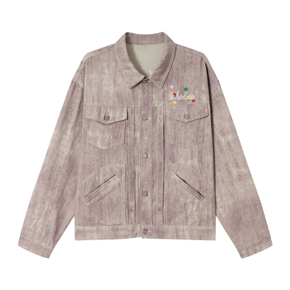 Mauve-pink washed trucker-style jacket, front view, with chest flap pockets, slanted pockets and small flower embroidery