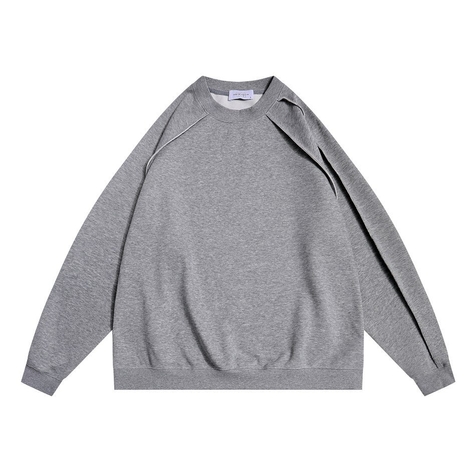 Dark heather gray crew-neck sweatshirt with raglan piping and a draped shoulder slit, flat front view