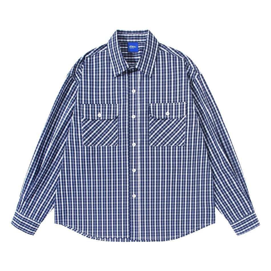 Blue and white plaid long-sleeve button-up shirt with two flap chest pockets, front view
