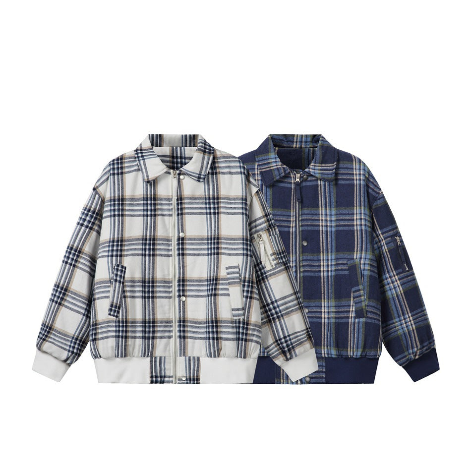 Two front-view plaid jackets: one cream with navy and tan checks, the other dark blue with lighter checks.