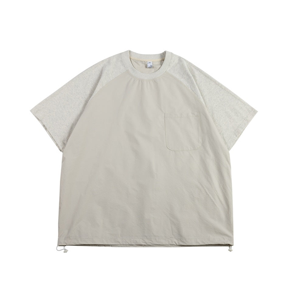 Apricot beige raglan T-shirt with heather gray sleeves, chest pocket and drawcord hem, front view