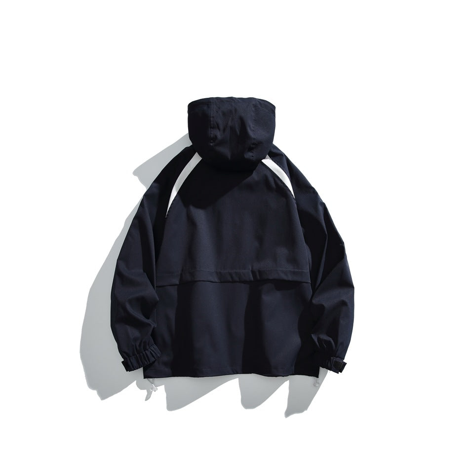 Back view of a navy hooded jacket with white accents along the shoulders and elastic cuffs.
