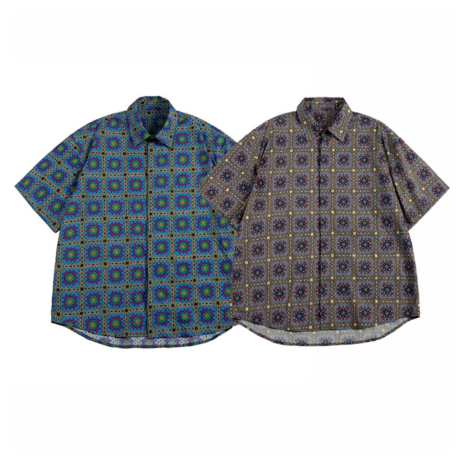 Two short-sleeve button-up shirts with square floral patterns: one gray with bright colors, the other brown with muted