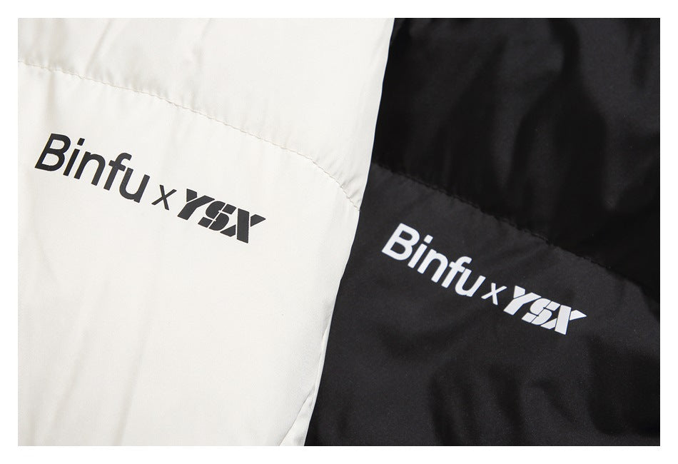 Close-up of black and cream jacket panels, each printed with a contrasting logo.