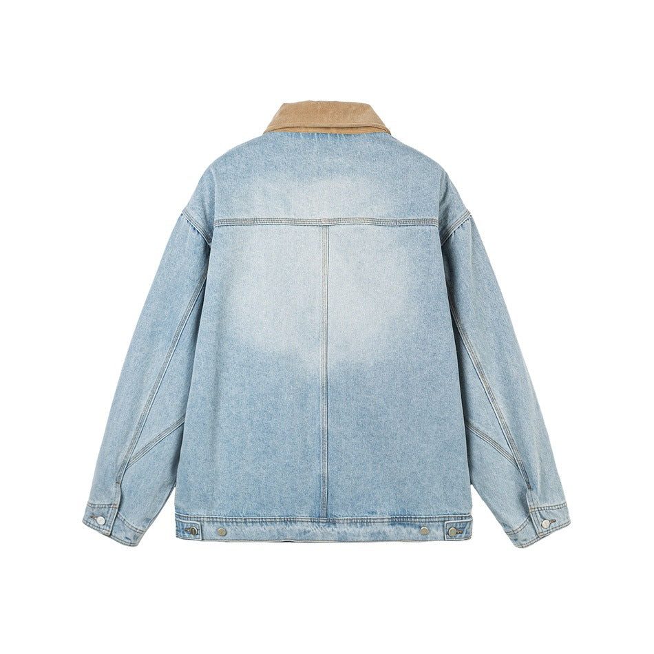 Back view of a light-wash denim jacket with a tan collar, center seam and button-tab hem.