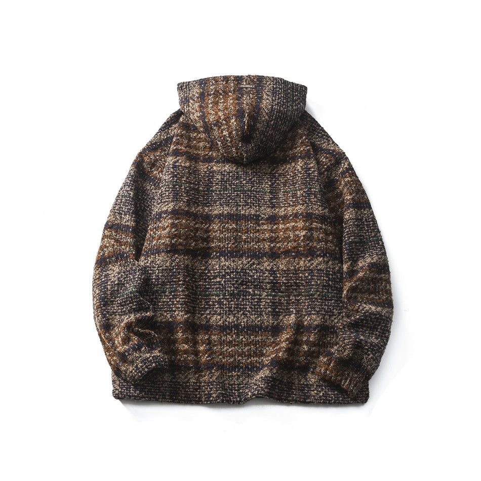 Back view of the plaid hooded pullover laid flat on a white background.