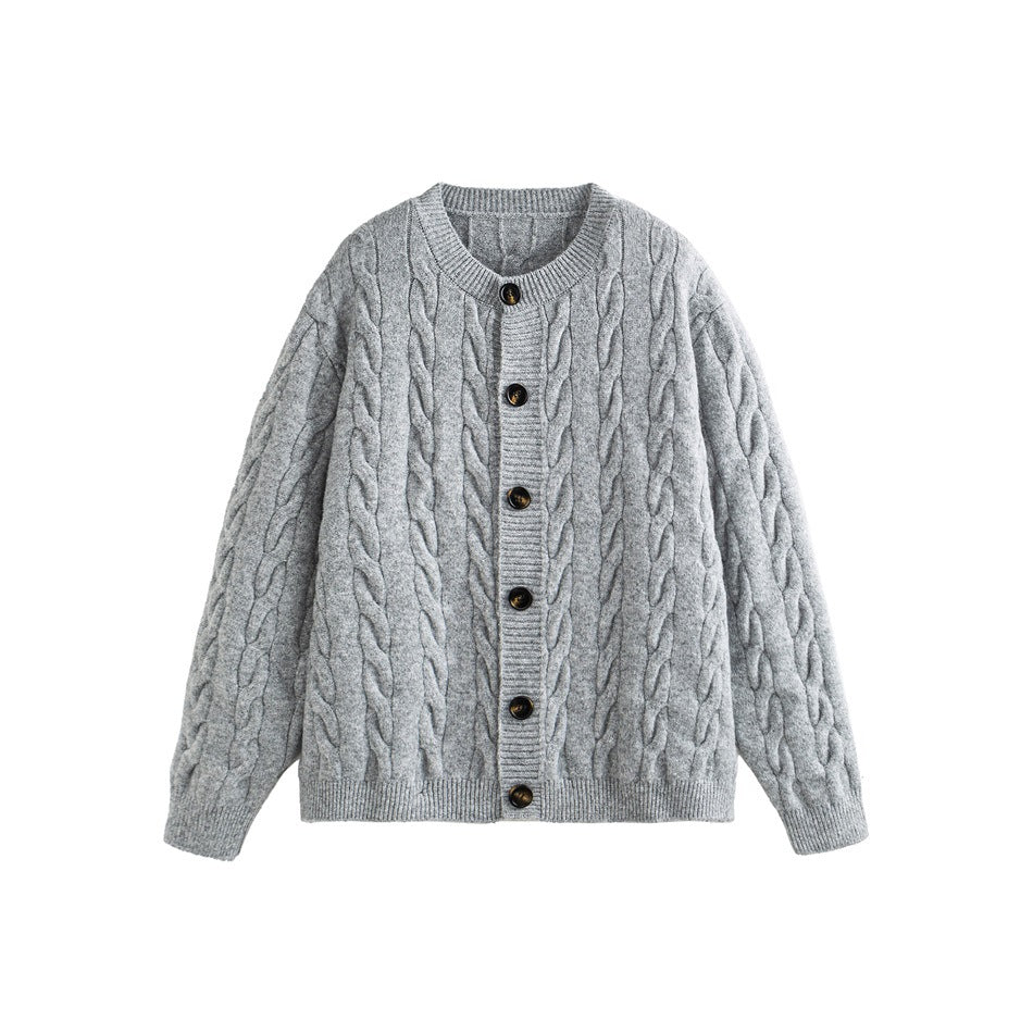 Light gray cable-knit button-front cardigan with dark buttons, flat lay on white background