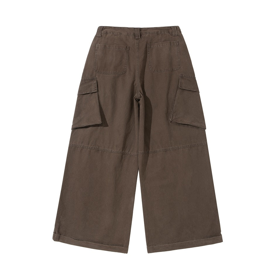 Back view of brown wide-leg cargo pants with two rear pockets and large side flap pockets.