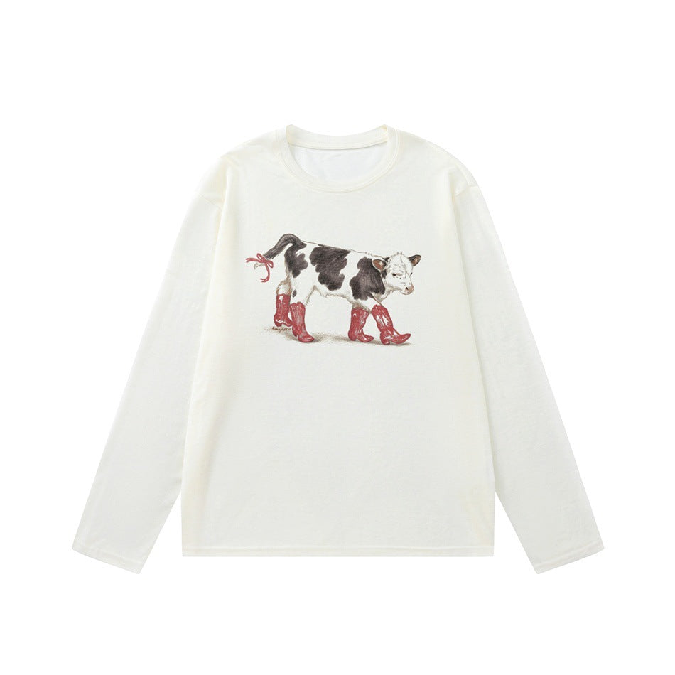 Off-white long-sleeve crew-neck tee with a calf in red cowboy boots graphic, flat lay front view