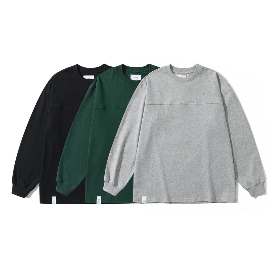 Three front-facing long-sleeve crewneck shirts in black, dark green, and heather gray.